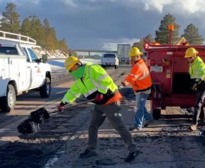 Roadwork crews address pavement damage from storms
