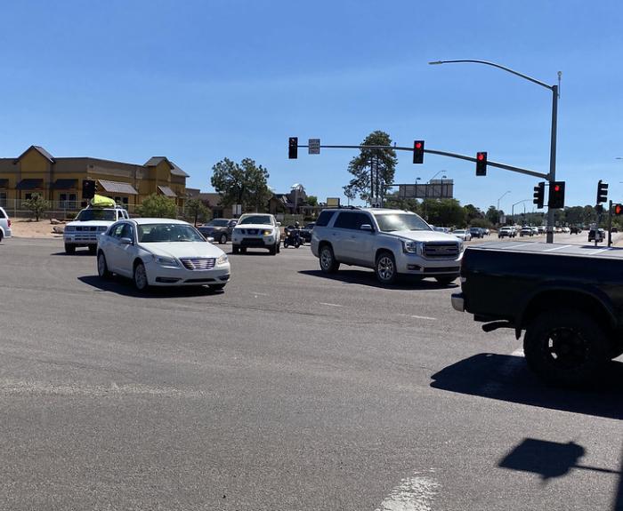 Traffic moving through an intersection.