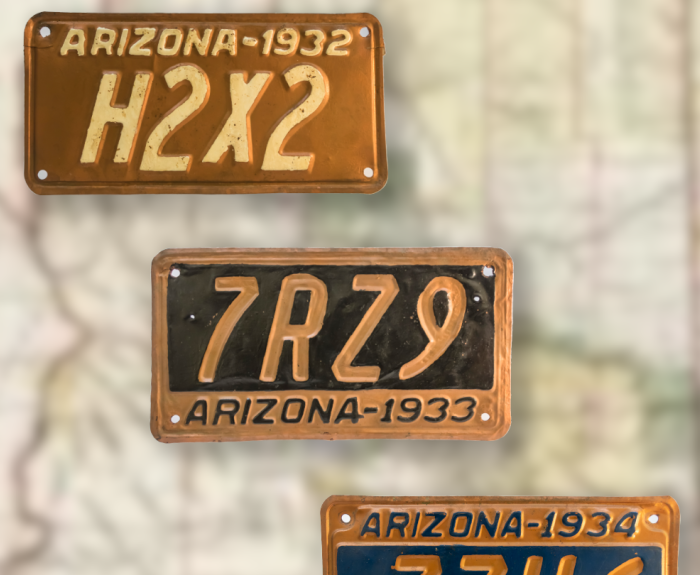 Three copper license plates from the 1930s are pictured over a background of a map of the state of Arizona.