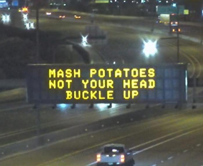 Freeway message board says "Mash Potatoes, Not Your Head"