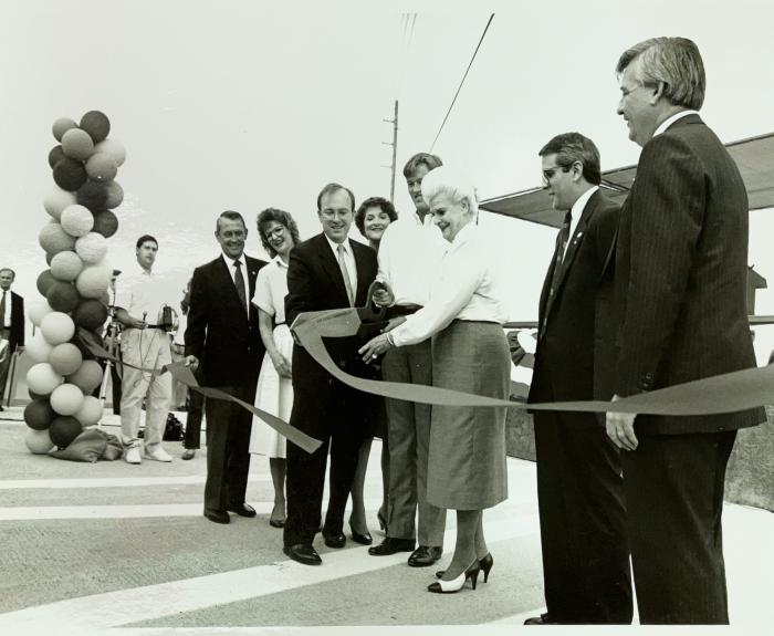 Governor Rose Mofford cutting the ribbon to State Route 51.