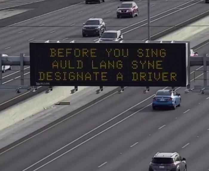 A digital message board encourages drivers to designate a driver