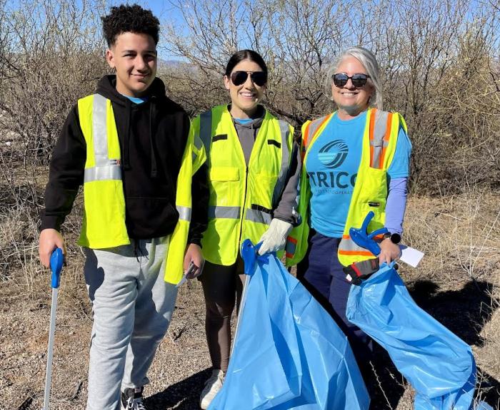 Volunteers [picking up litter