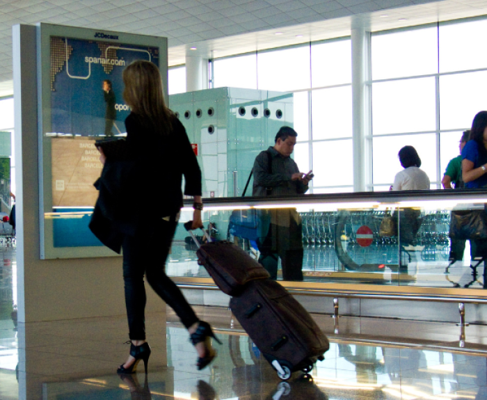 People walking in an airport.