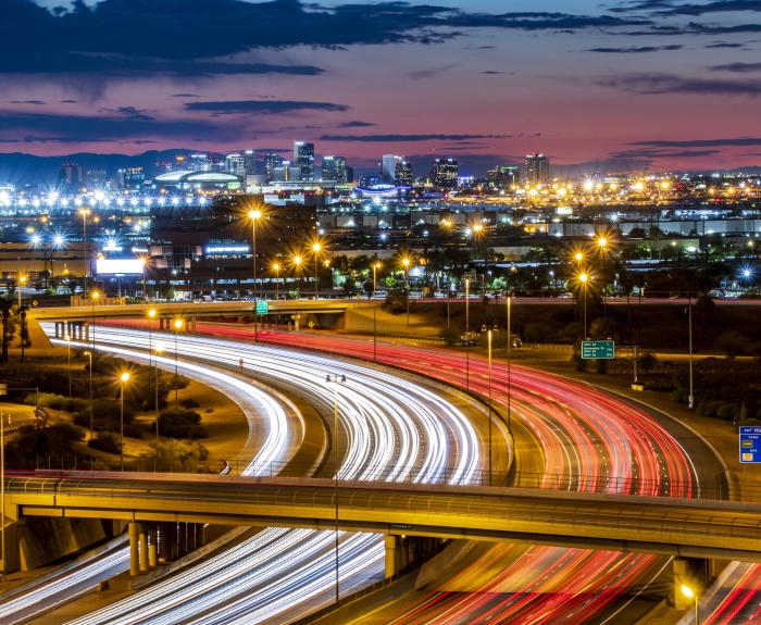 An urban freeway at night.