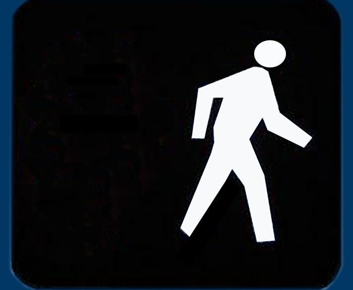 Crosswalk signal showing it's safe to walk