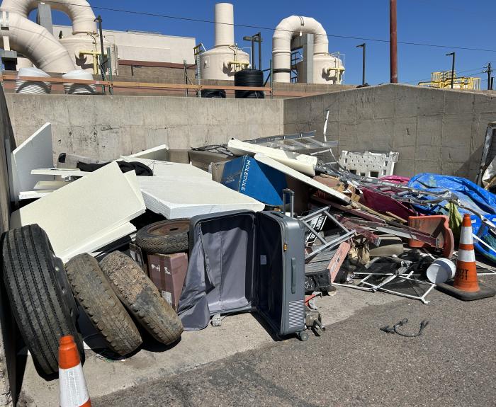 Debris removed from highways is piled up.