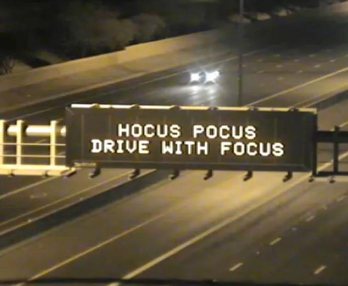A digital message board on the highway encourages motorists to drive with focus.