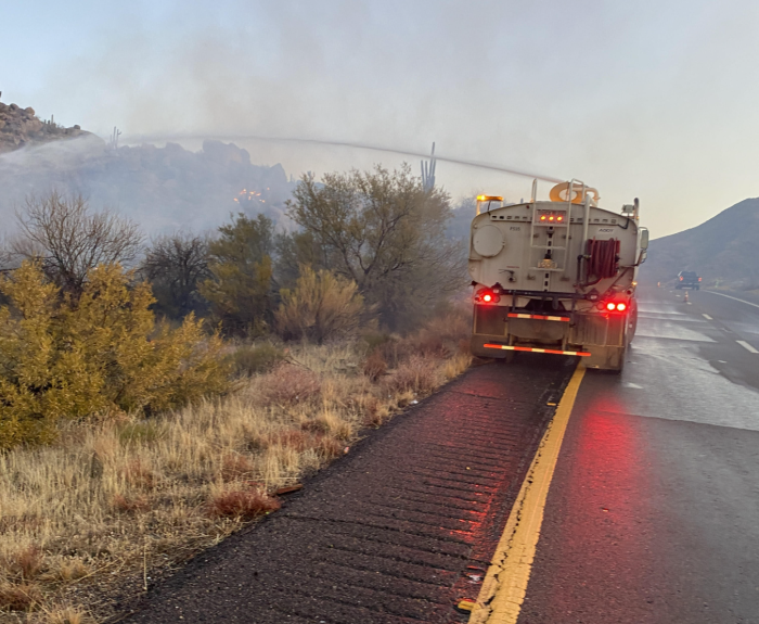 ADOT tanker sprays water on fire
