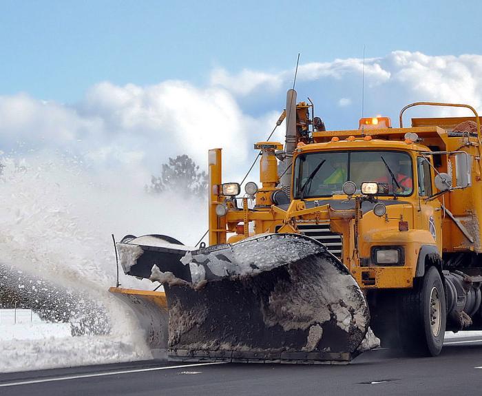 ADOT snowplow clearing highway