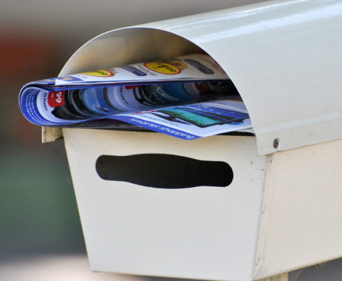 A mailbox with mail in it