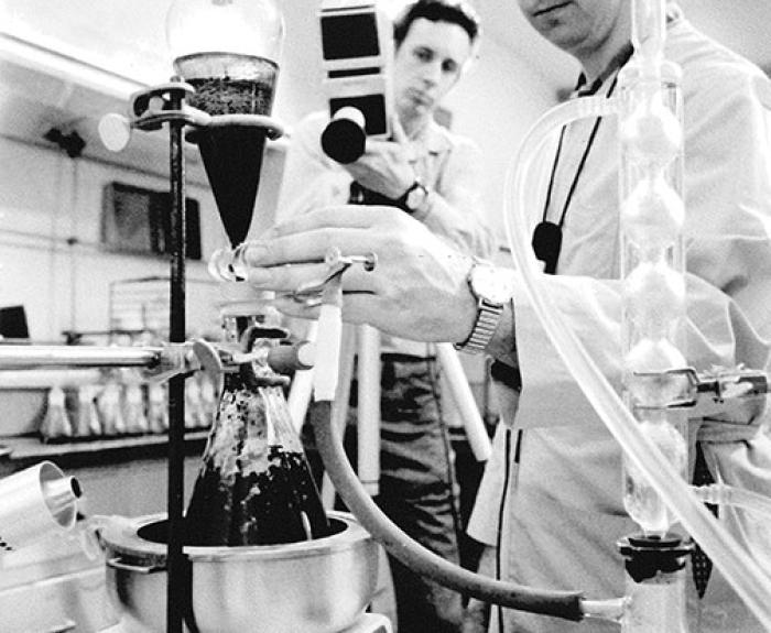 b/w ADOT scientists working on the lab