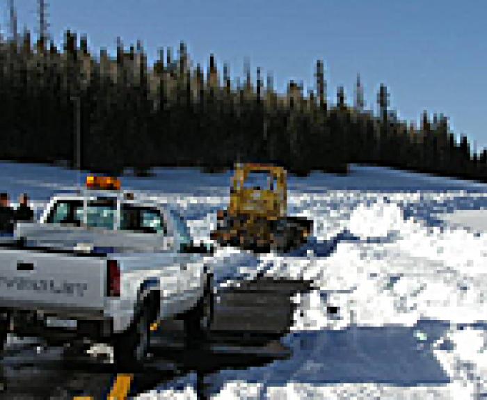 ADOT plowing snow