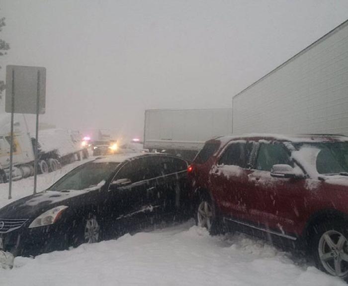 Multiple vehicle roadway crash in snow