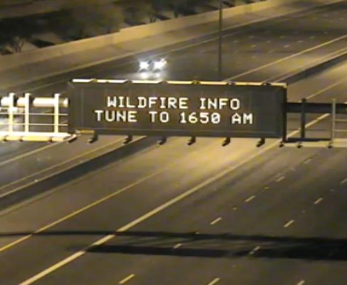 Wildfire Info Tune to 1650 AM - Highway sign