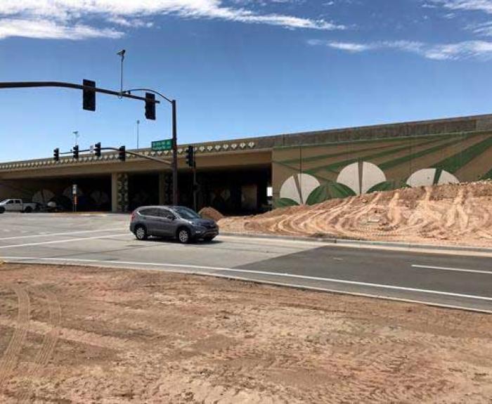 Car on frontage road