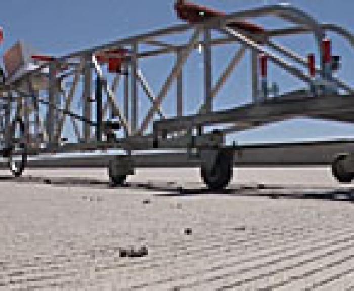 Worker using a profilograph