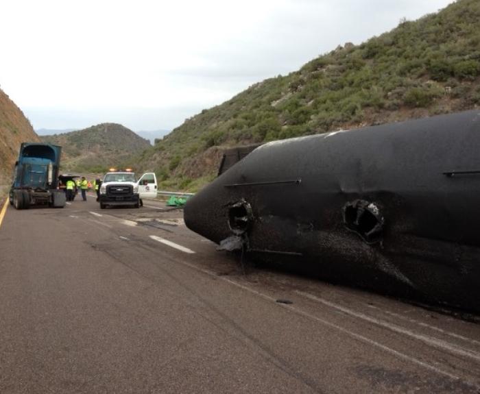 Overturned tanker and spilled contents on State Route 87