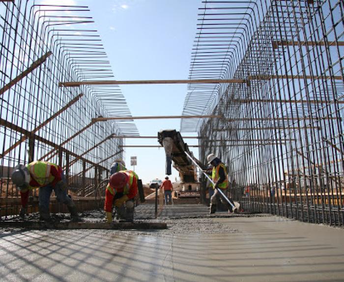 Crew pours a bridge deck