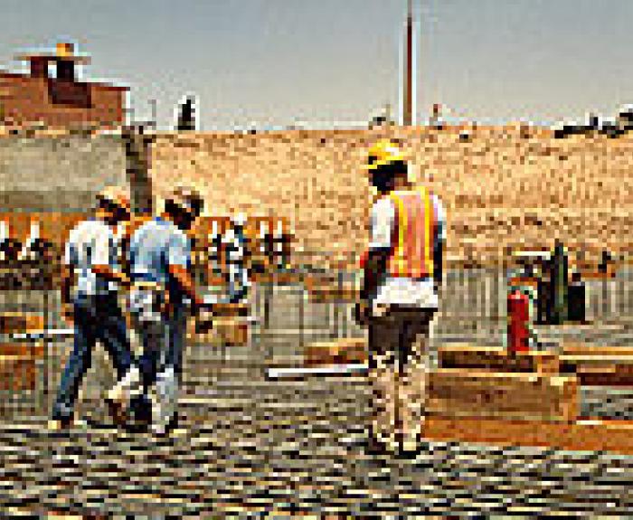 Construction workers building tunnel