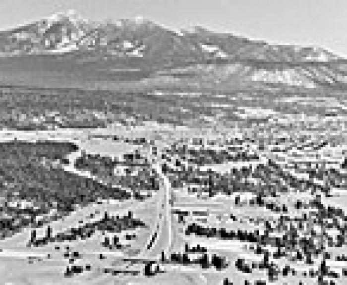 Old photo of Flagstaff with snow on mountain