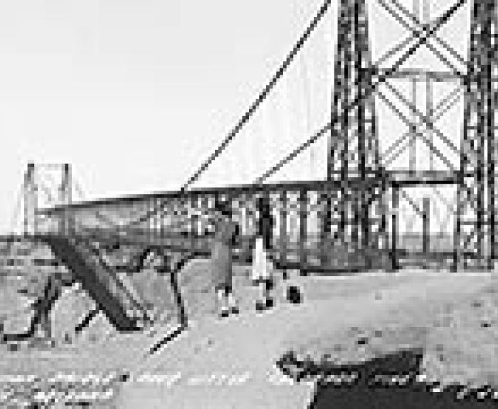 Two Women looking at Suspension Bridge Cameron AZ