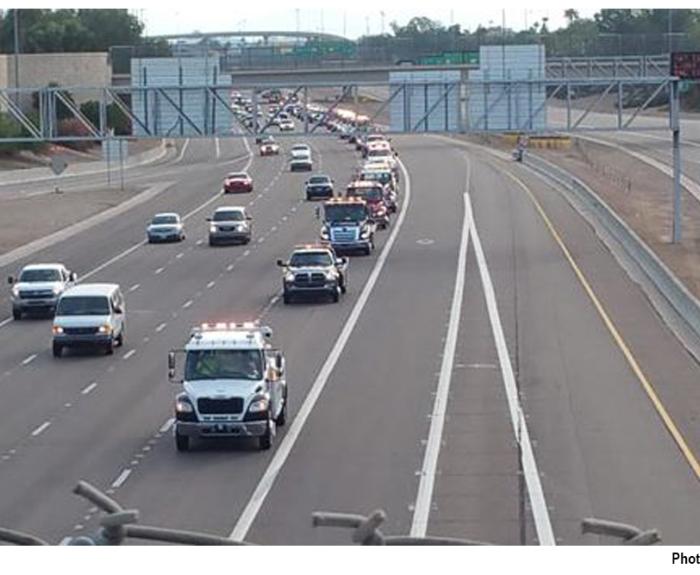 Tow truck parade on freeway
