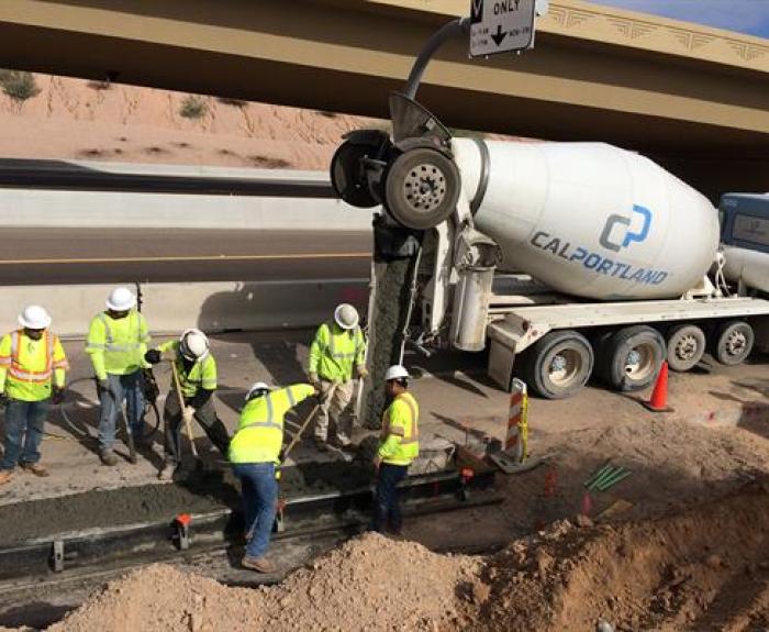 Crew pours concrete during South Mountain Freeway construction