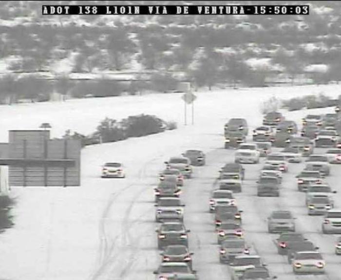 Image of snowy roads from ADOT camera