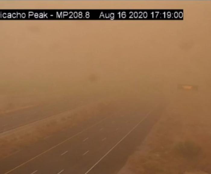 Dust storm reduces visibility on Interstate 10, viewed through traffic camera.