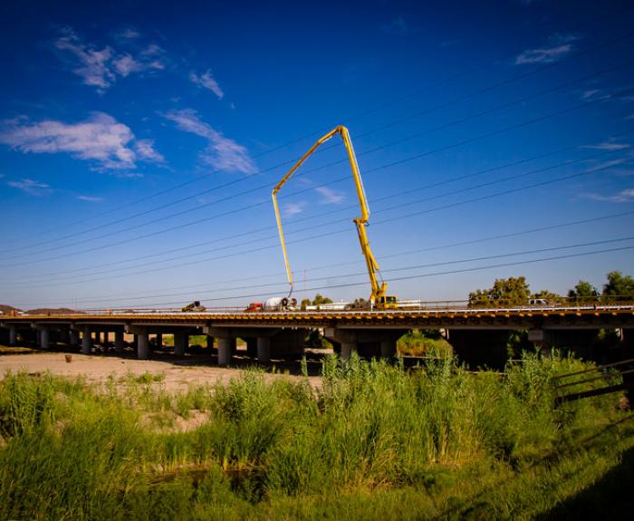Concrete poured for bridge deck over Santa Cruz River near I-10