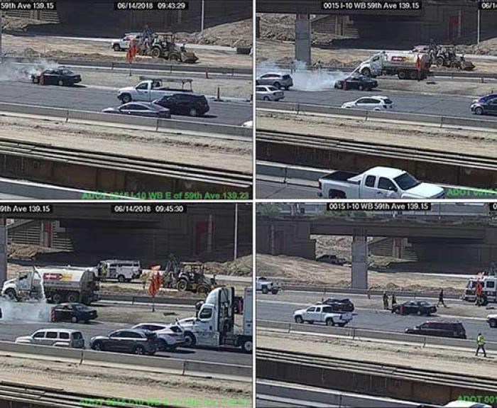 Traffic camera views of freeway vehicle fire and response
