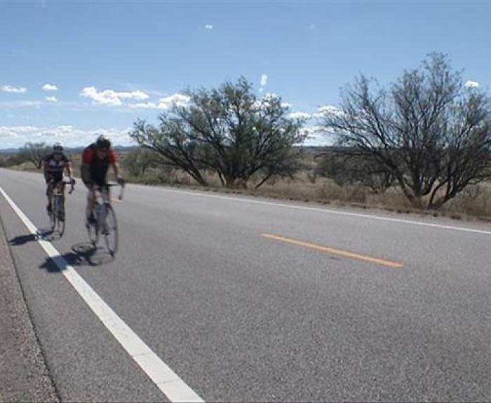Bike riders on highway