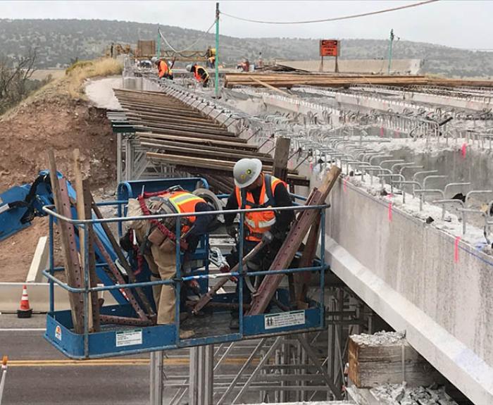 Road crew working on improving a bridge at I 40 near Seligman.