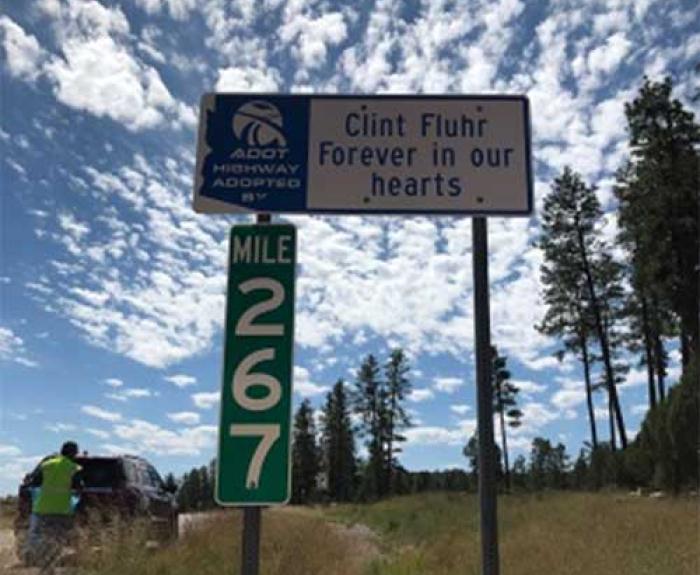 Adopt a Highway Clint Fluhr memorial sign