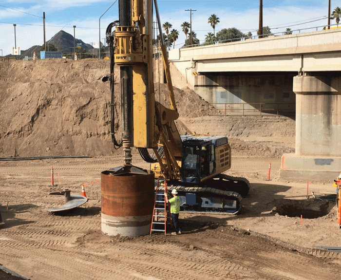 Large machine drills hole for bridge pier