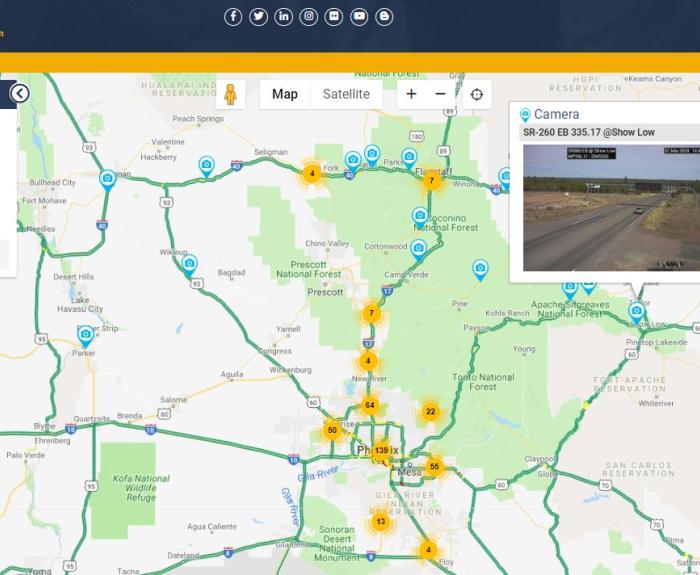 Screenshot of the Arizona 511 traffic map showing routes, live camera feeds, traffic incidents, and map legend with various traffic conditions and alert categories.