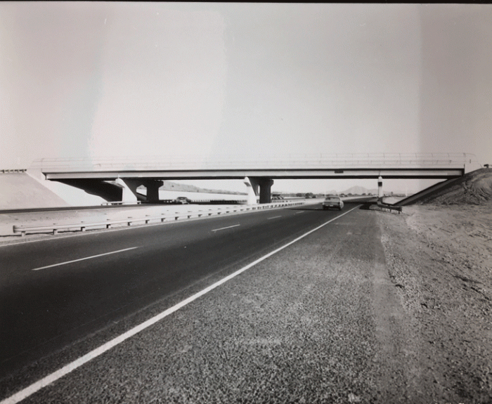 Black and white image of I-10 and overpass