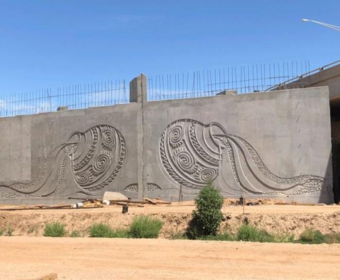 Wall art depicts native baskets