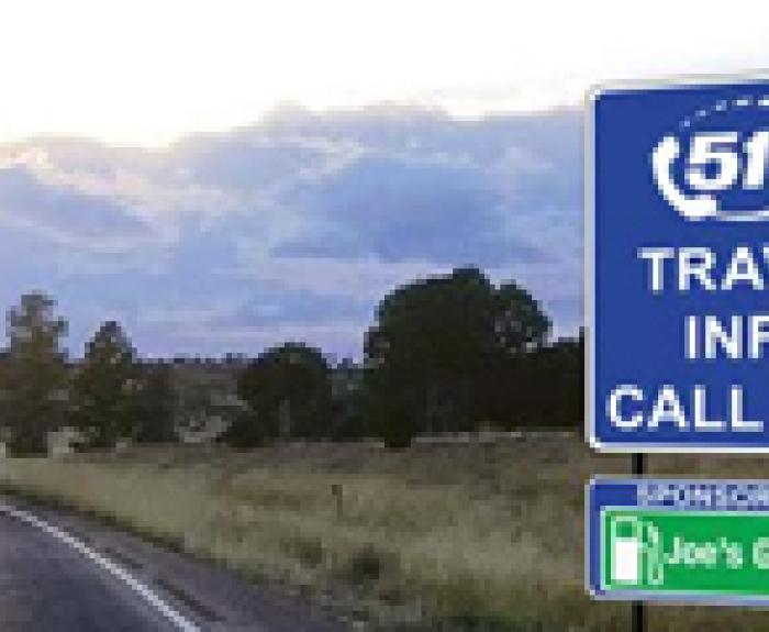 511 Travel Info sign along a highway.