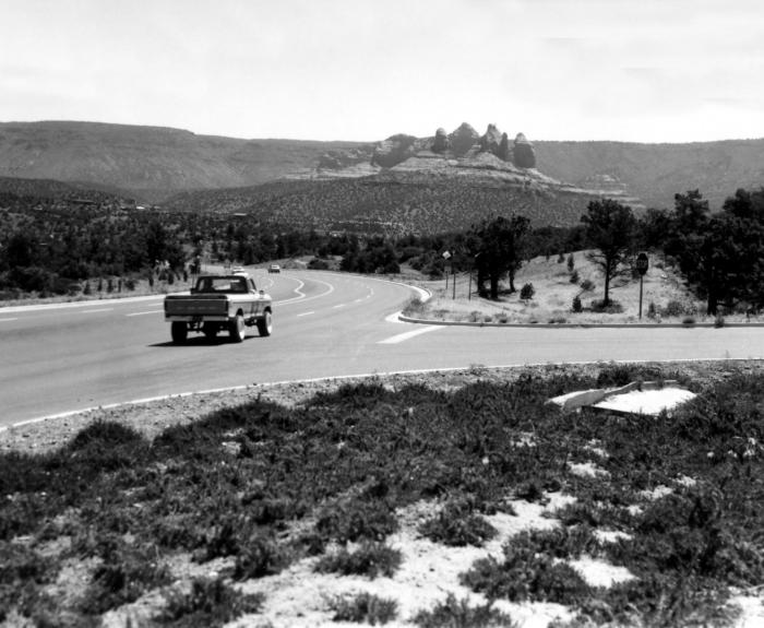 Black and white image of truck driving on SR 89A