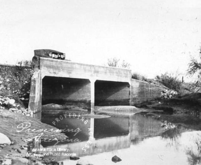 Historic photo of car using bridge along highway to Yuma