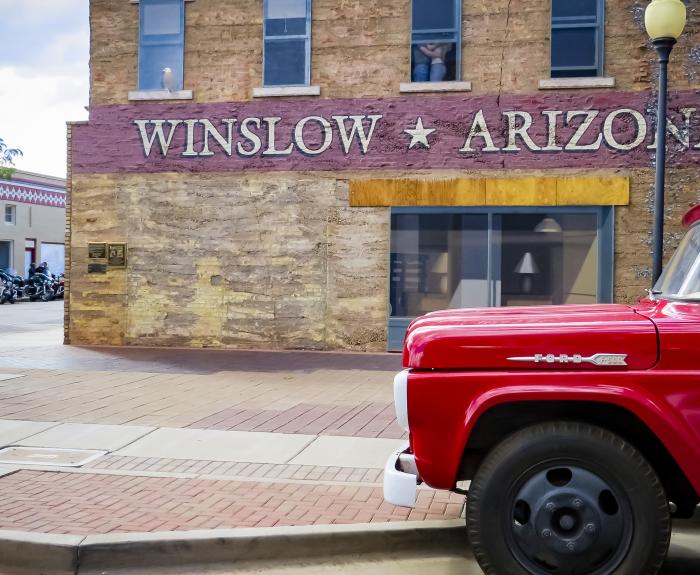 Standing on a corner display in Winslow