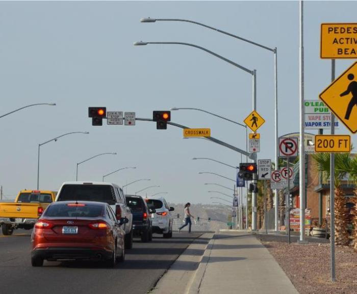 Photo of pedestrian hybrid beacon and cars