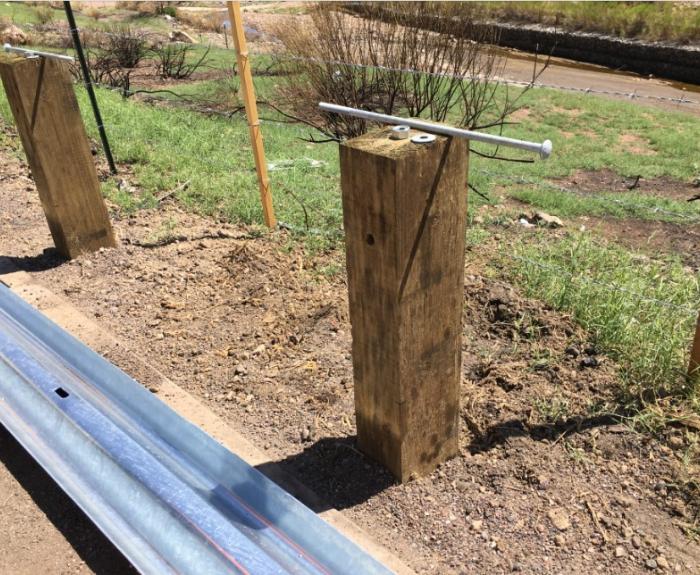 Guardrail posts, rail and bolts, awaiting assembly