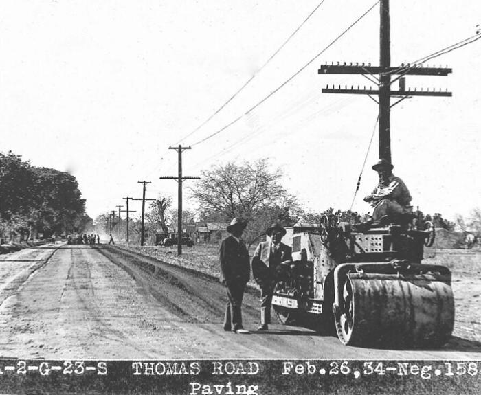 Black and white photo of road paving