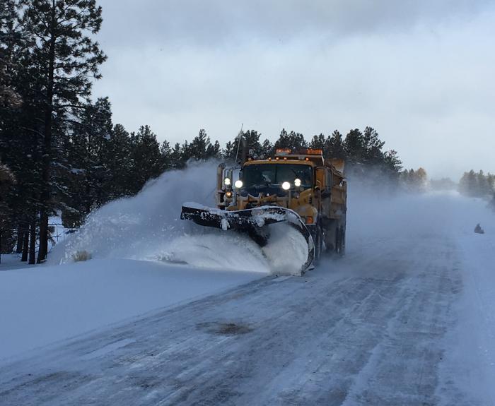 ADOT snowplow clears snow on highway in Arizona’s mountain areas
