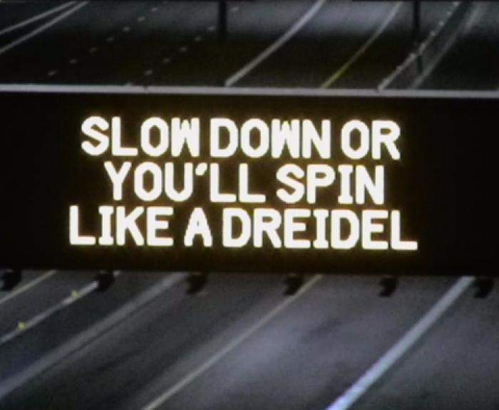 Freeway board with holiday safety message