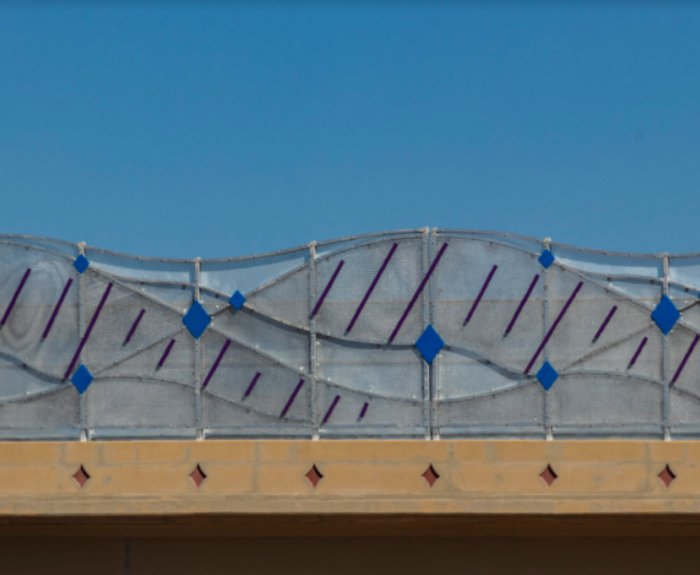 Blue diamond artwork on bridge