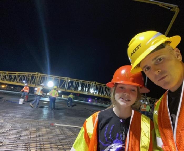 Engineer Jeremy Moore and his daughter at bridge deck pour